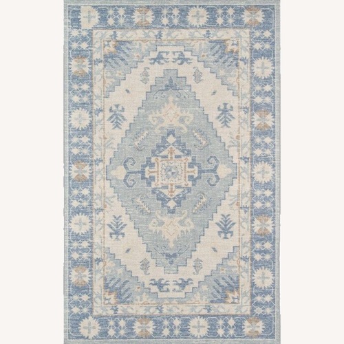 Used Momeni Anatolia Area Rug 7'9" x 9'10" for sale on AptDeco