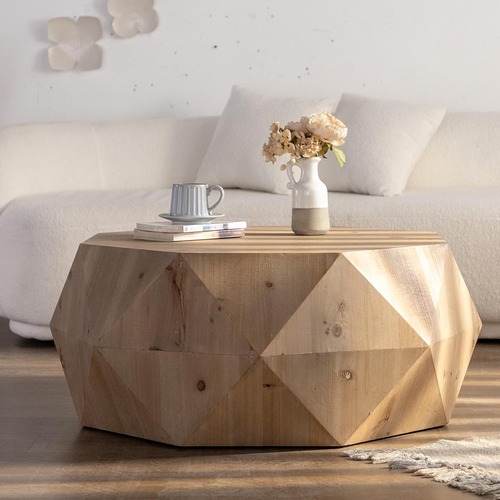 Used Amazon Sculptural Round Wood Coffee Table for sale on AptDeco