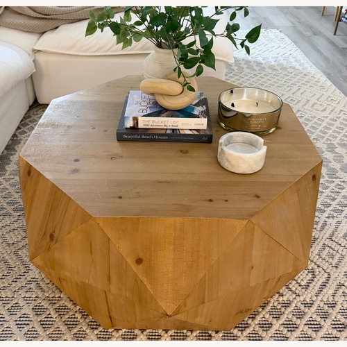 Used Amazon Sculptural Round Wood Coffee Table for sale on AptDeco