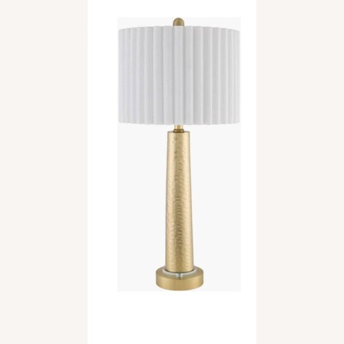 Used Surya Gold Metal Table Lamp for sale on AptDeco
