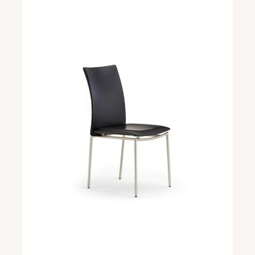 Used Skovby Black Leather Dining Chairs for sale on AptDeco