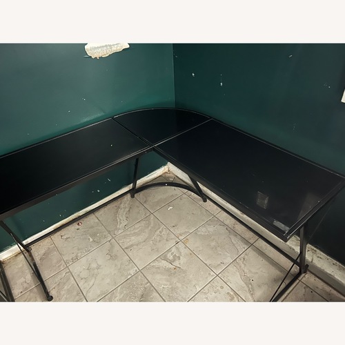 Used Black Glass Corner Desk for sale on AptDeco