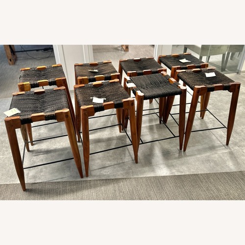 Used  CB2 Nahla Saddle Bar Rope Stool for sale on AptDeco