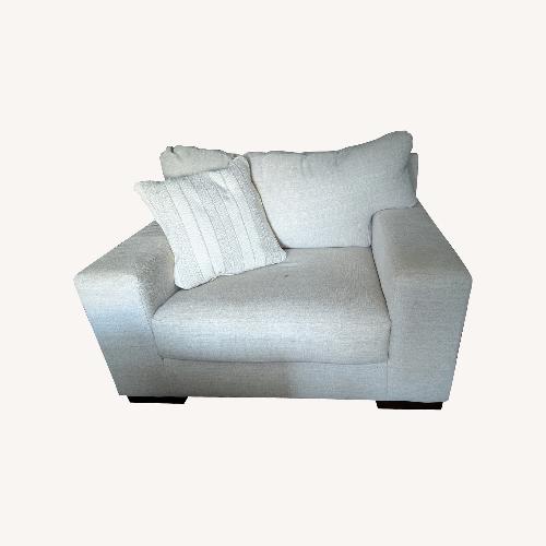 Used Ashley Furniture Modern Chair and a Half - Cream Color for sale on AptDeco