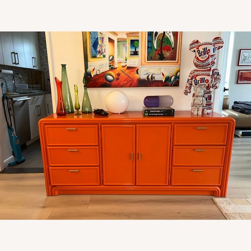 Used Vintage/Antique Orange Wood Sideboard for sale on AptDeco