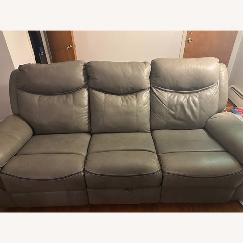 Used Raymour & Flanigan Ross Reclining Sofa W Drop Down Table for sale on AptDeco