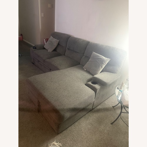 Used 2 Piece Sectional Pull Out + Storage Bin  for sale on AptDeco