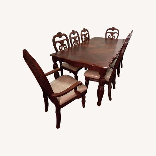 Used Dark Brown Wood Dining Set for sale on AptDeco