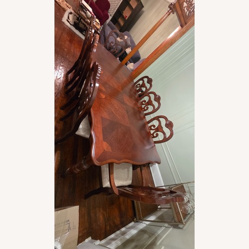 Used Dark Brown Wood Dining Set for sale on AptDeco