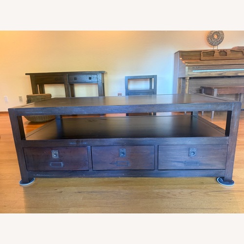 Used Pottery Barn Rhys Dark Brown Coffee Table for sale on AptDeco