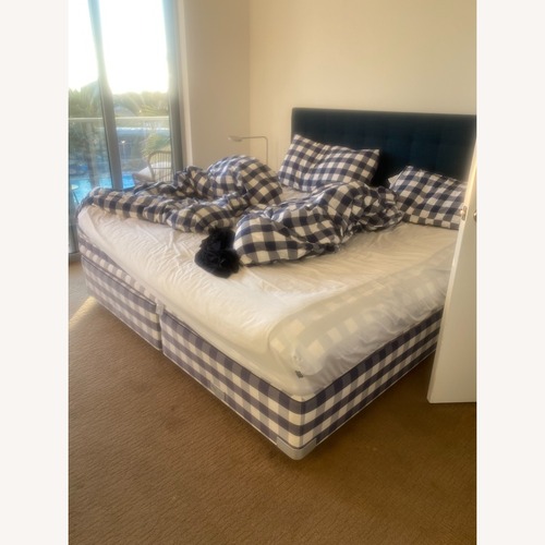 Used Hästens Blue King Bed for sale on AptDeco