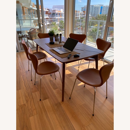 Used Arne Jacobsen Light Brown Leather Dining Chairs for sale on AptDeco