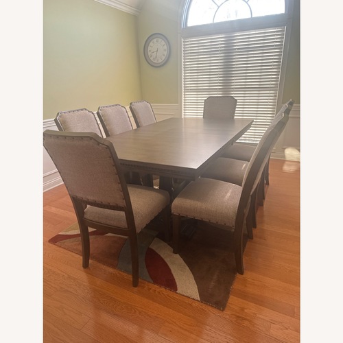 Used Ashley Furniture Dark Brown Wood Dining Sets for sale on AptDeco