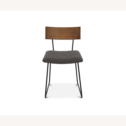 Used Scandinavian Designs Light Brown Dining Chairs for sale on AptDeco