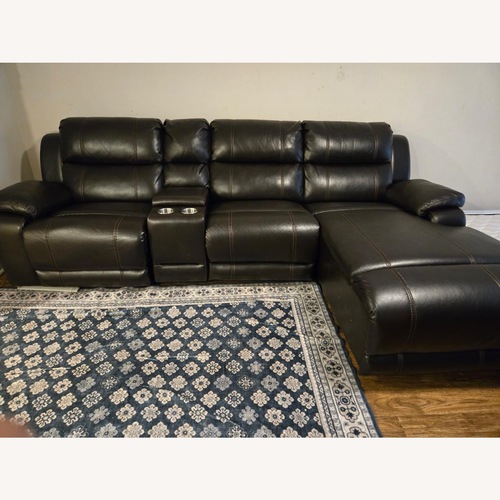 Used Raymour & Flanigan Dark Brown 3+ Piece Sectional for sale on AptDeco
