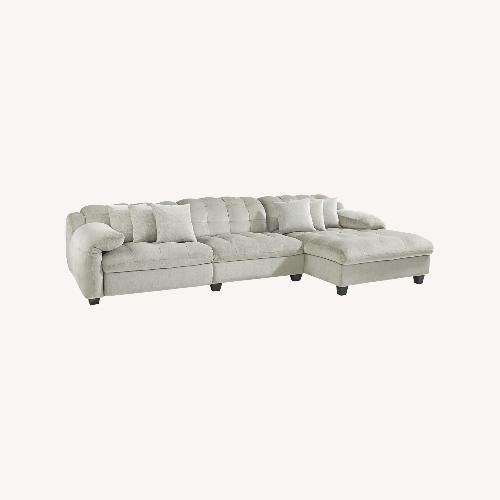 Used Rooms To Go  Light Gray Fabric 3+ Piece Sectional for sale on AptDeco