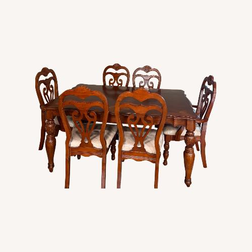 Used A&E Wood Designs Dark Brown Wood Dining Table for sale on AptDeco