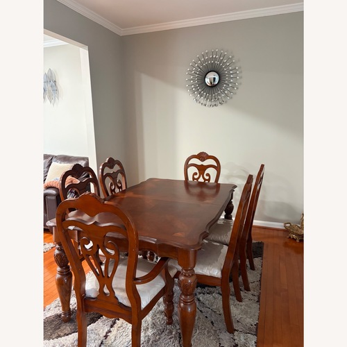 Used A&E Wood Designs Dark Brown Wood Dining Table for sale on AptDeco