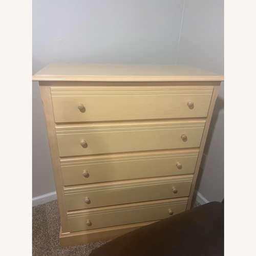 Used Ashley Furniture Kids Natural Wood Dresser for sale on AptDeco