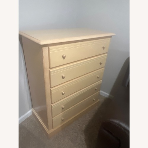 Used Ashley Furniture Kids Natural Wood Dresser for sale on AptDeco