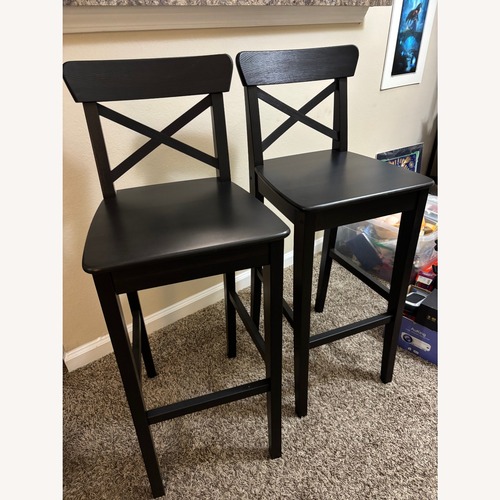 Used IKEA Rosentorp Black Wood Stools for sale on AptDeco