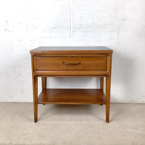Used Vintage Mid-Century Nightstand with Black Top for sale on AptDeco