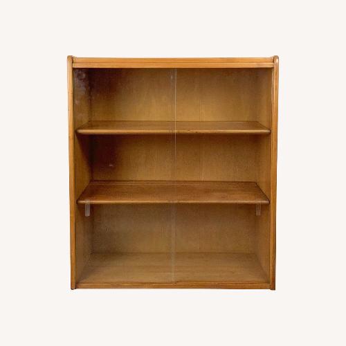 Used Vintage Low Bookcase with Sliding Doors for sale on AptDeco