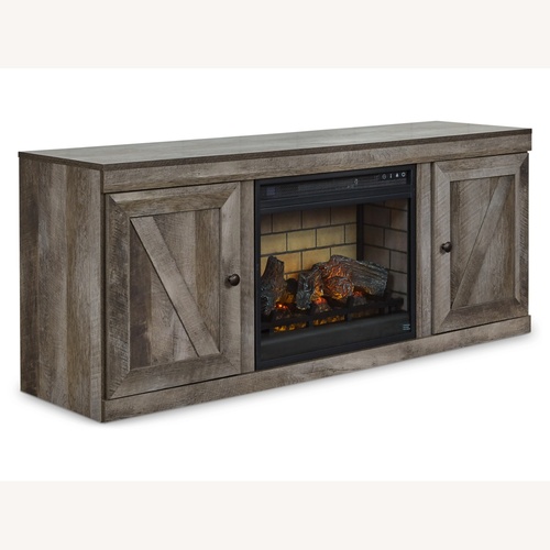 Used Ashley Furniture Wynnlow Light Brown Wood Media Storage for sale on AptDeco