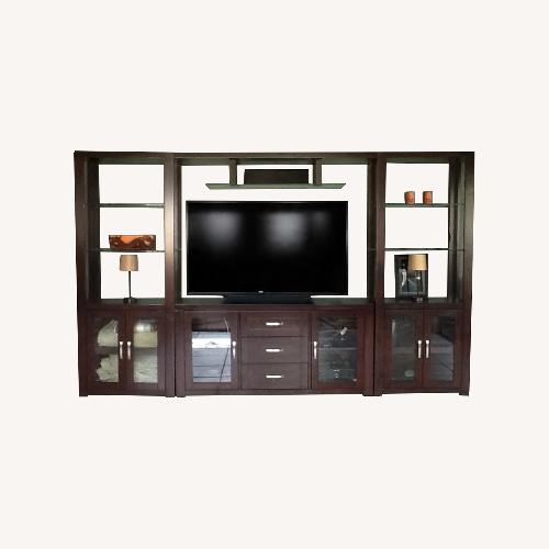 Used Rooms To Go TV Wall Entertainment Center in Dark Wood for sale on AptDeco