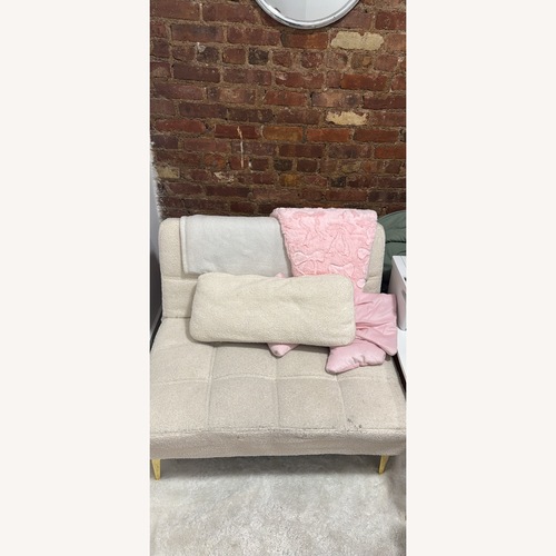 Used Teddy Fabric Futon Sofa Bed for sale on AptDeco
