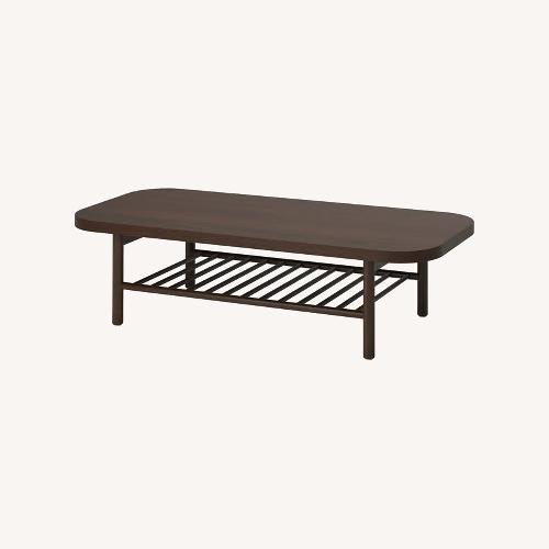 Used IKEA LISTERBY Dark Brown Wood Coffee Table for sale on AptDeco