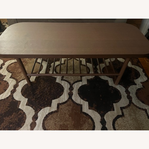 Used IKEA LISTERBY Dark Brown Wood Coffee Table for sale on AptDeco