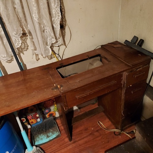Used Vintage/Antique Singer Dark Brown Wood Dresser for sale on AptDeco