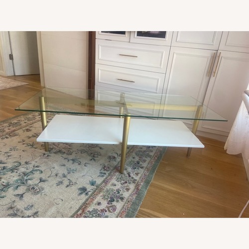 Used Wade Logan Otto Glass Top Coffee Table for sale on AptDeco
