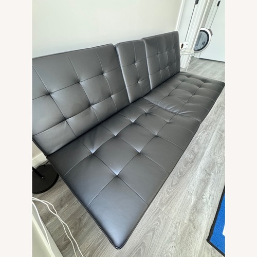 Used Black Faux Leather Futon for sale on AptDeco
