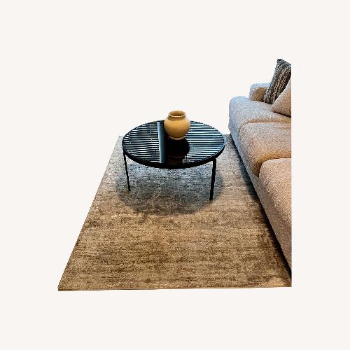 Used Ashley Furniture Area Rug 65' x 90' for sale on AptDeco