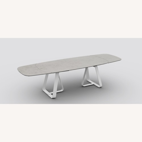 Used Calligaris Sunshine Natural Ceramic Dining Table for sale on AptDeco