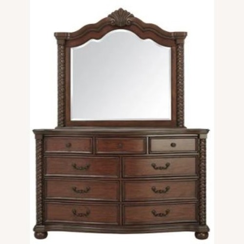 Used Raymour & Flanigan Dark Brown Wood Dresser for sale on AptDeco