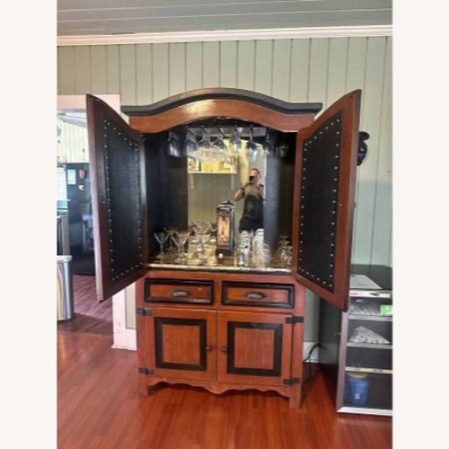 Used Solid Wood Living Room Bar + Glassware for sale on AptDeco