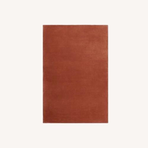 Used Nordic Knots Brick Rug for sale on AptDeco