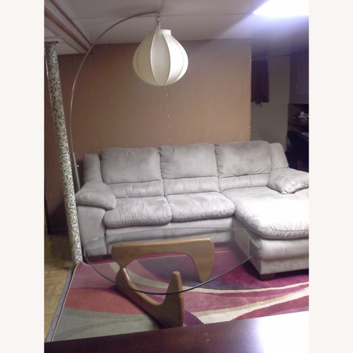 Used Triangle Base Coffee Table for sale on AptDeco