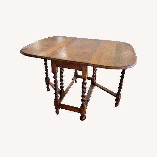 Used Antique Wood Drop Leaf Table W Barley Twist Legs for sale on AptDeco