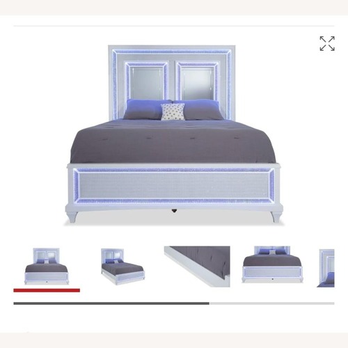 Used Bob's Discount Furniture Glamour White Wood King Bed for sale on AptDeco