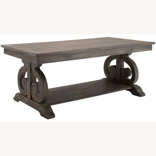 Used Raymour & Flanigan Dark Brown Olivia Rectangular Cocktail Table for sale on AptDeco