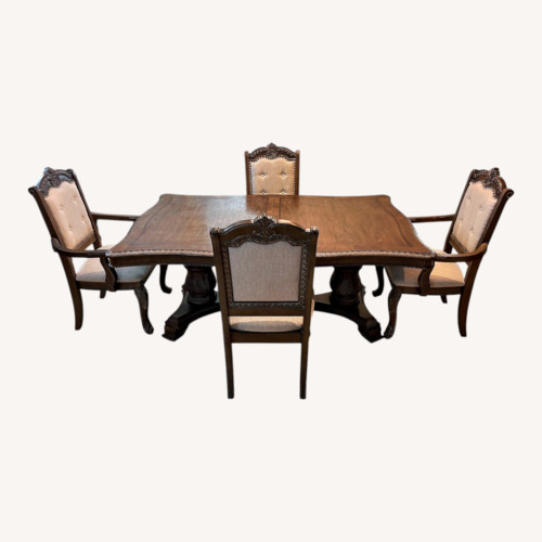 Used Luxury Solid Wood Dining Table + 8 Chairs for sale on AptDeco
