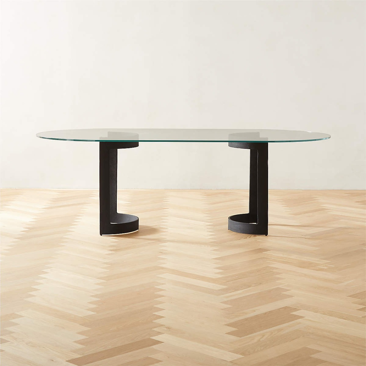 CB2 Orrin Black Oval Dining Table - image-1