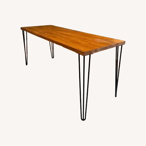 Used Natural Dining Table for sale on AptDeco