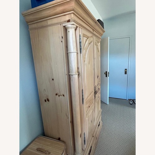 Used Natural Wood Armoire for sale on AptDeco