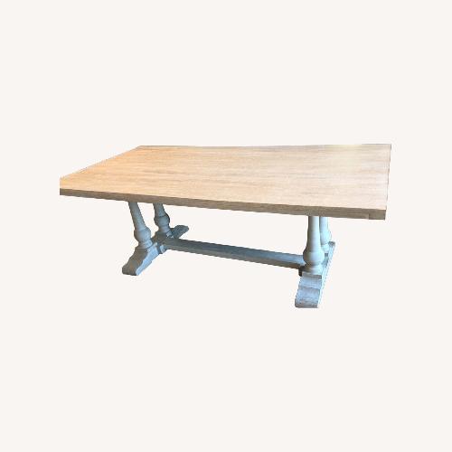 Used Living Spaces Leon Natural Wood Dining Table for sale on AptDeco