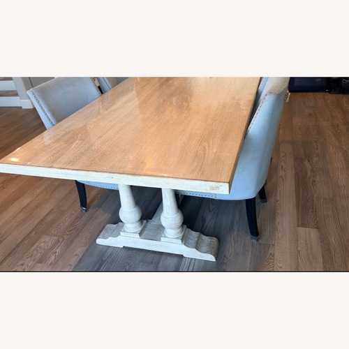 Used Living Spaces Leon Natural Wood Dining Table for sale on AptDeco